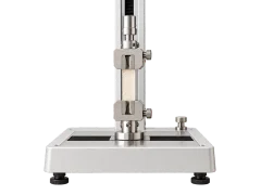 Illustrative textile testing apparatus holding a narrow fabric sample.